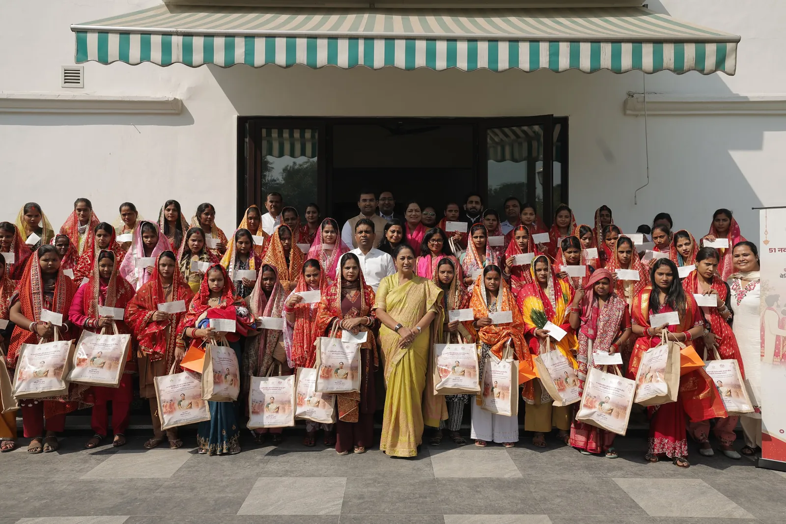 CM Rekha Gupta Hands Over ₹1 Lakh Cheques and Karwa Chauth Kits to 51 Newlywed Women on Their First Karwa Chauth