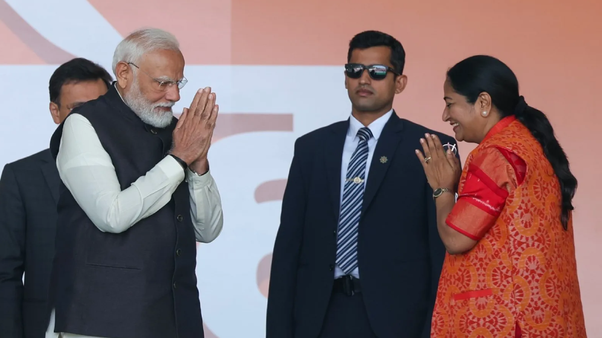 Delhi CM Rekha Gupta exchanging greetings with folded hands at a public event